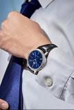 Orient Automatic Watch for Men, Japanese Wrist Watch See-Through Case Back Classic Blue Dial, Date Display Roman Numerals Stainless Steel Leather Strap Gift for him RA-AC0J05L10B